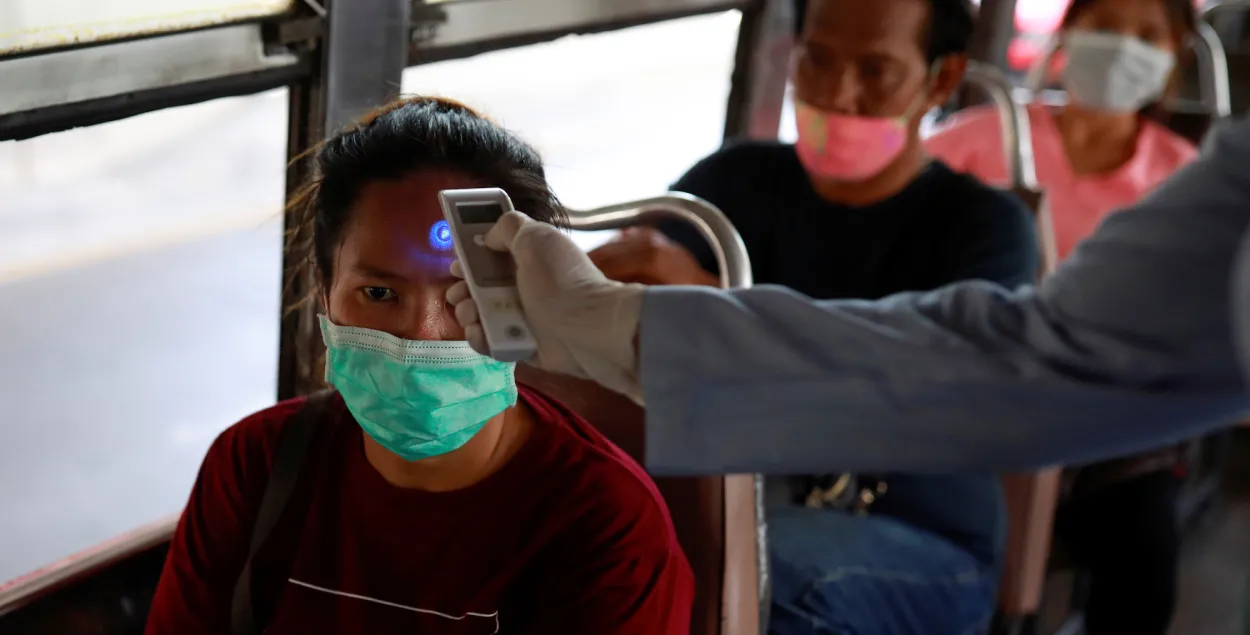 Public transport passengers in Thailand checked / Reuters