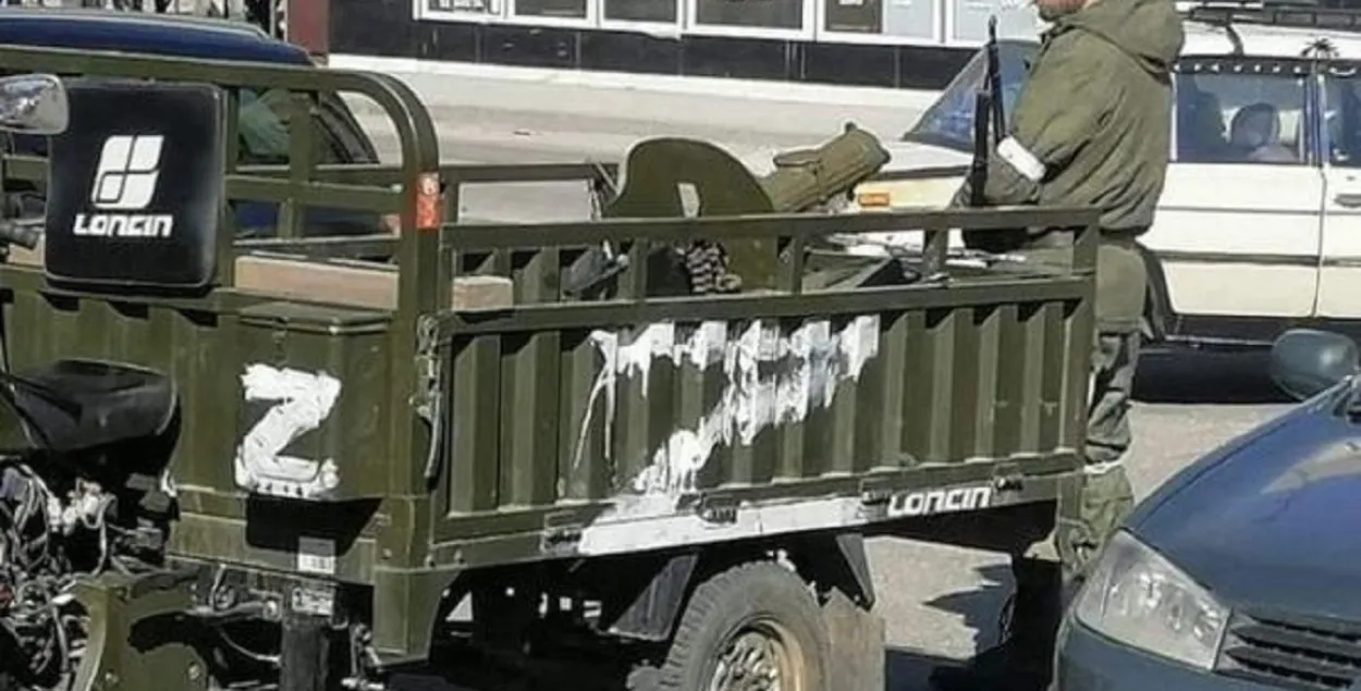 Боевик "Л/ДНР" с пулемётом "Максим" / pap.pl​