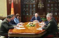 President Lukashenka and Security Council members discussing the detention of Russian citizens, 29 July 2020 / Reuters