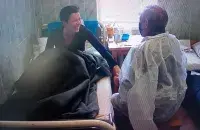 Maryia Kalesnikava with her father after surgery
