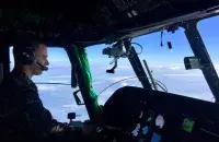 Major Alyaksandr Isachanka at the helicopter air controls / photo from Alyaksandr​
