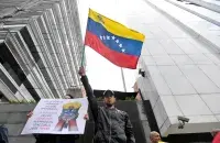 A protester&nbsp;in Caracas after the presidential elections / Reuters