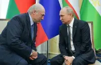 Alyaksandr Lukashenka and Vladimir Putin/ Reuters