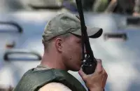 A Belarusian serviceman during exercises near the Polish border&nbsp;
