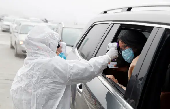 Медицинская проверка в Китае / Reuters