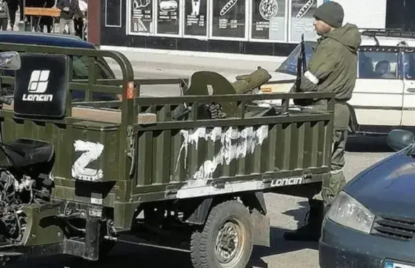 Боевик "Л/ДНР" с пулемётом "Максим" / pap.pl​