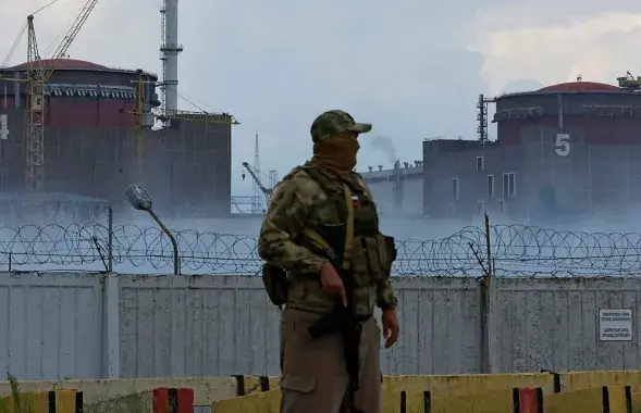 Расійскі вайсковец на Запарожскай АЭС / Reuters
