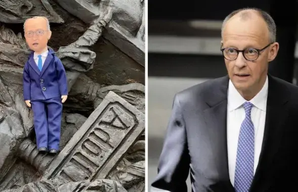 Кукла на памятнике Рокоссовскому и Фридрих Мерц
