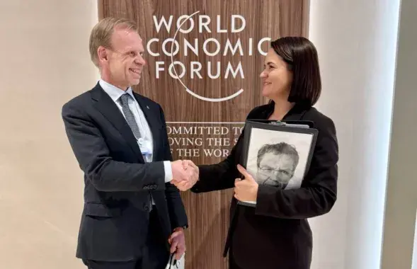 Свейн Турэ Хольсетэр і Святлана Ціханоўская ў Давосе
